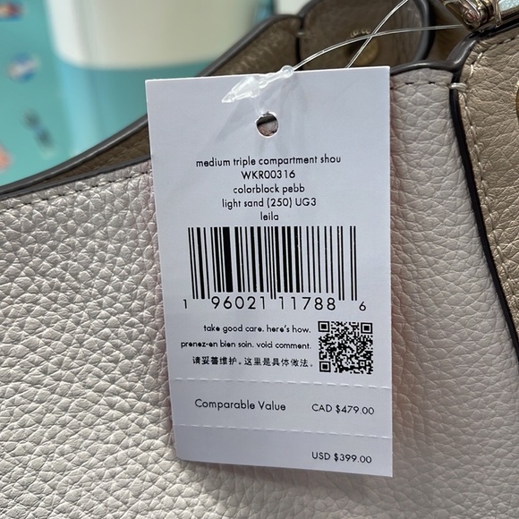 Kate Spade Leila Medium Triple Compartment Shoulder Bag
Light Sand - Picture 10 of 16